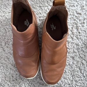 Nike Women's Tan Slip-On Sneakers